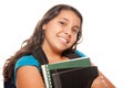 Pretty Hispanic Girl with Books and Backpack Royalty Free Stock Photo