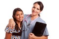 Pretty Hispanic Girl and Female Doctor Isolated Royalty Free Stock Photo