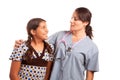 Pretty Hispanic Girl and Female Doctor Isolated Royalty Free Stock Photo