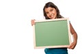 Pretty Hispanic Girl Holding Blank Chalkboard Royalty Free Stock Photo