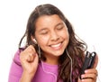 Pretty Hispanic Girl Listening to Music Royalty Free Stock Photo