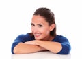 Pretty hispanic looking at you with arms crossed Royalty Free Stock Photo