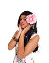 Pretty Indian woman with pink rose. Royalty Free Stock Photo