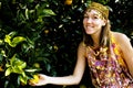 Pretty islam woman in orange grove smiling, real muslim girl che