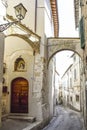 Pretty Italian village. Characteristic alley with a sacred image