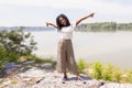 Pretty ivorian girl posing on the bank of a river Royalty Free Stock Photo