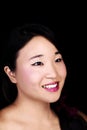 Attractive Japanese American Woman Smiling Portrait Dark Background Royalty Free Stock Photo