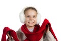 Pretty joyful little girl in warm winter things with knitted scarf Royalty Free Stock Photo