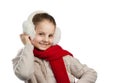 Pretty joyful little girl in warm winter things with knitted scarf Royalty Free Stock Photo