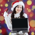 Pretty lady online shopping for christmas Royalty Free Stock Photo