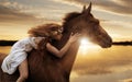 Pretty lady riding a horse by gallop