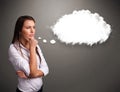 Pretty lady thinking about cloud speech or thought bubble with c Royalty Free Stock Photo