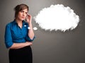 Pretty lady thinking about cloud speech or thought bubble with c Royalty Free Stock Photo