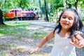 Pretty latin kid with a train like background