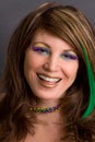Pretty Laughing Woman in Mardi Gras Makeup