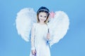 Pretty little angel girl. Valentines day. Christmas Cute little Angel. Cute toddler girl in white wings as Cupid.