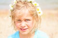 Pretty Little Blond Girl with a Crown of Daisies Royalty Free Stock Photo