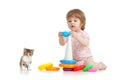 Pretty little child or kid playing with color toy