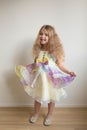 Pretty little dancing girl. Children`s holiday. Royalty Free Stock Photo