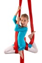 Pretty little girl in a blue gymnastic suit Royalty Free Stock Photo