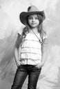Pretty little girl with cute face in western cowboy hat Royalty Free Stock Photo