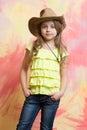 Pretty little girl with cute face in western cowboy hat Royalty Free Stock Photo