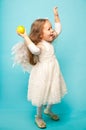 Pretty little girl dancing in a fine white dress Royalty Free Stock Photo