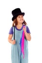 Pretty little girl doing magic with a top hat and a magic wand Royalty Free Stock Photo