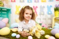 Pretty little girl with ducklings and chikens on lawn Royalty Free Stock Photo