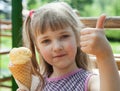 Pretty little girl eating an ice-cream Royalty Free Stock Photo