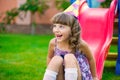 Pretty little girl having fun on playground Royalty Free Stock Photo