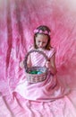 Pretty little girl in her pink easter dress