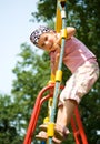 Pretty little girl on outdoor playground