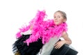 A pretty little girl with a pink feather boa Royalty Free Stock Photo