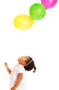 Pretty little girl playing with balloons Royalty Free Stock Photo