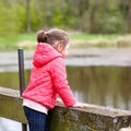 Pretty little girl relax at beauty summer landscape background Royalty Free Stock Photo