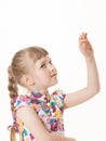 Pretty little girl showing an indefinite gesture