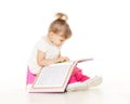 Pretty little girl sits on potty. Royalty Free Stock Photo