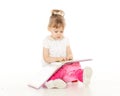 Pretty little girl sits on potty. Royalty Free Stock Photo