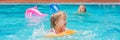 Pretty little girl swimming in outdoor pool and have a fun with inflatable circle BANNER, long format Royalty Free Stock Photo