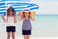 Pretty little girls (sisters) on the beach. Royalty Free Stock Photo