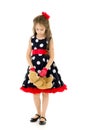 Pretty Long Haired Girl Wearing Polka Dot Dress Posing with Teddy Bear Royalty Free Stock Photo