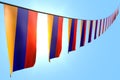 Pretty many Armenia flags or banners hangs diagonal on rope on blue sky background with bokeh - any occasion flag 3d illustration