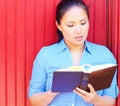 Pretty Mixed Race Woman Reading Holy Bible