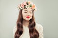 Pretty Model Looking Aside. Beautiful Woman with Long Hair, Make up and Flowers. Spring Beauty Girl Royalty Free Stock Photo