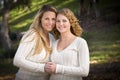 Pretty Mother and Daughter Portrait in Park