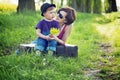 Pretty mother hugging her son and lauging Royalty Free Stock Photo