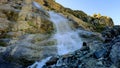 pretty mountain highland fast water cascade at summertime day - photo of nature