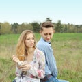 Pretty nice young couple eating ice cream outdoors. Royalty Free Stock Photo