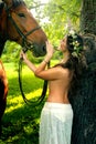 Pretty nude woman with horse Royalty Free Stock Photo